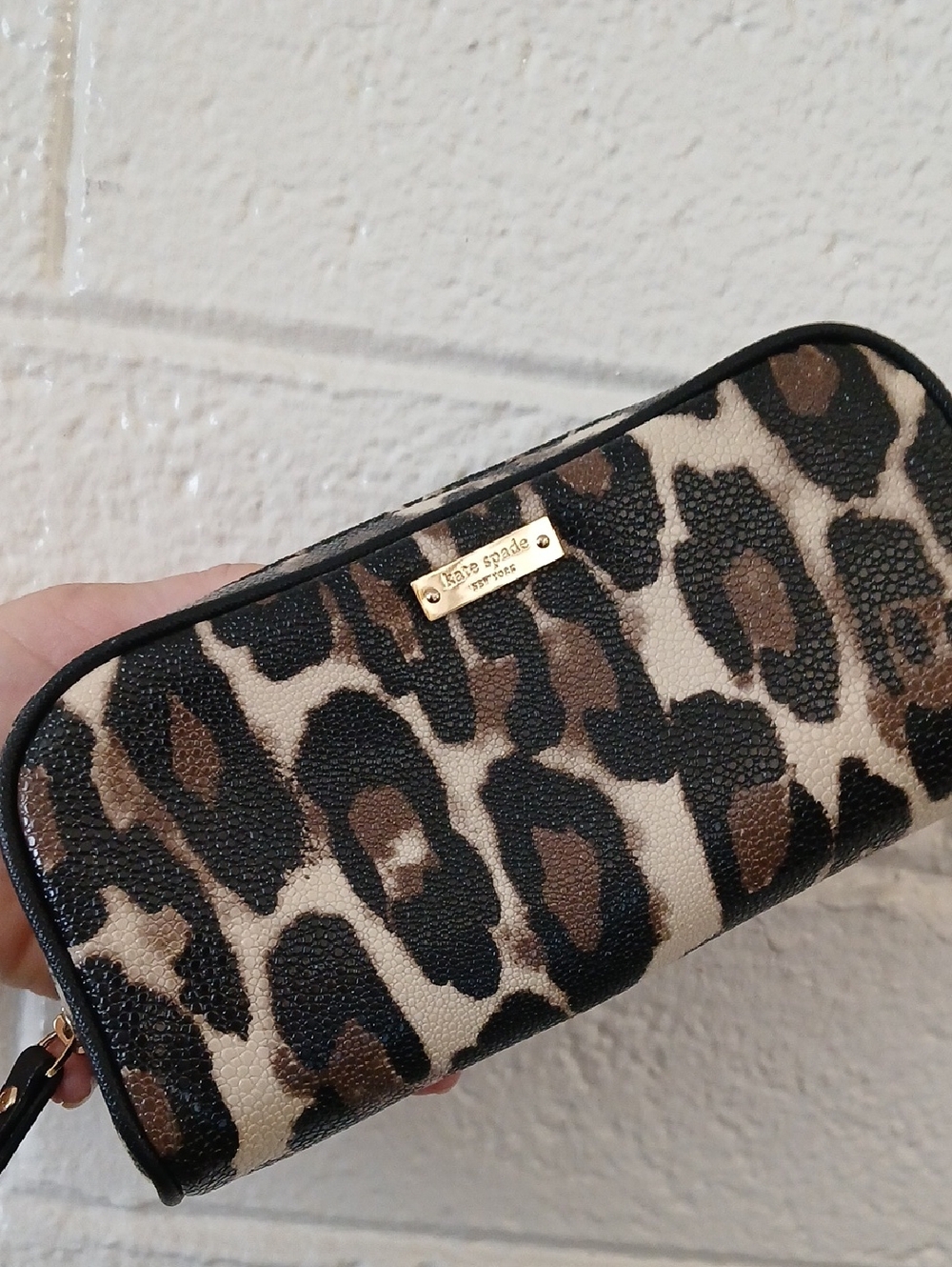 Kate Spade New York Leopard Print Pouch.